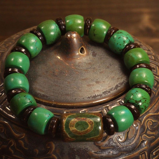 A hand string with three-eyed celestial beads made of raw turquoise ore